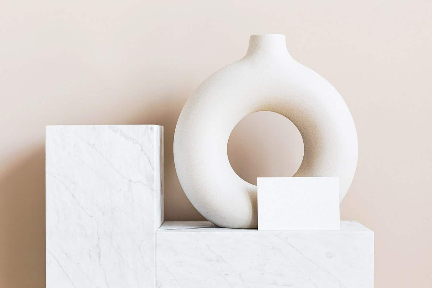 A still life of marble, plaster, and ceramic forms.